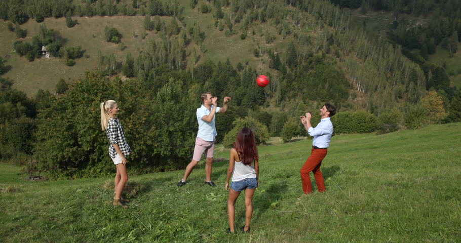 Beautiful Group of Friends Playing Volleyball Green Grass Mountain Team Building | Shutterstock HD Video #27915679