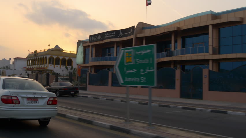 sunset sky dubai city road trip side window jumeirah street panorama 4k uae