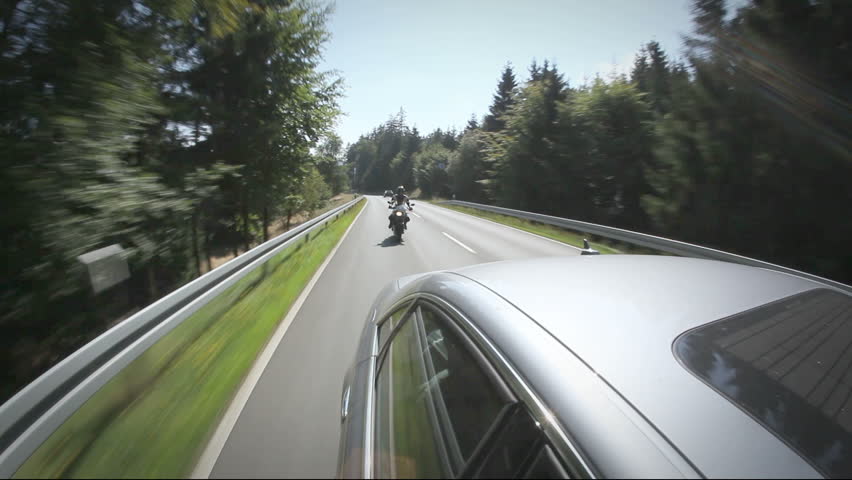 Motorcycle racing on the highway