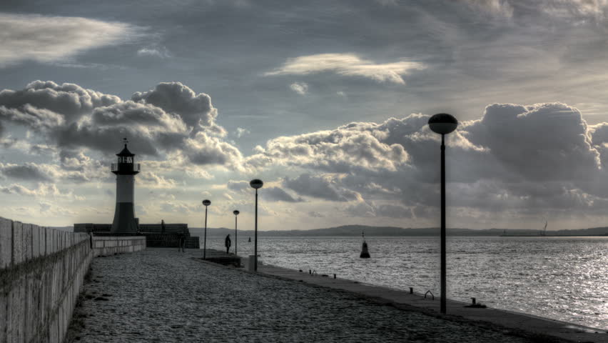 SASSNITZ, GERMANY, OCT 19, 2011: HDR Time lapse Lighthouse and esplanade in