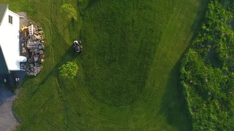 aerial lawn tractor mowing lawn unique angle