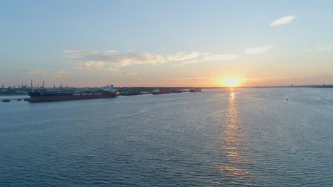 Aerial View of Cargo Ships at Sunset Docked in Southampton, UK