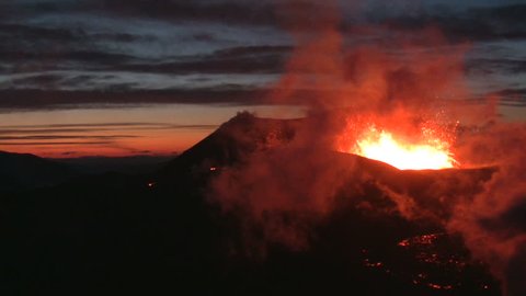 Volcanic Eruption in Iceland Marz 2010, Eyjafjallajokull. Footage taken in extreme conditions only a half mile from the crater during frequent gas explosions from advancing lava. A mountain is born.