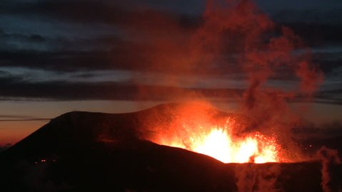 Volcanic Eruption in Iceland  2010, Eyjafjallajokull. Footage taken in extreme conditions only a half mile from the crater during frequent gas explosions from advancing lava. A mountain is born.