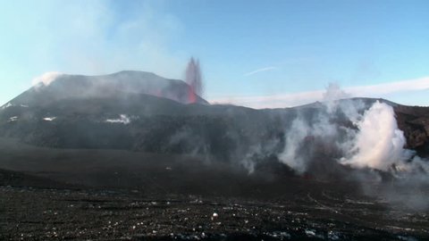 Volcanic Eruption in Iceland  2010 in Eyjafjallajokull. Footage taken in extreme conditions only a half mile from the crater during frequent gas explosions from advancing lava. A mountain is born.