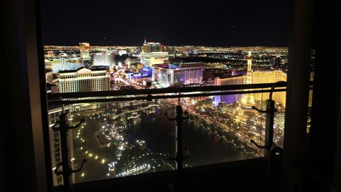 Forward Sliding Time Lapse from Las Vegas High Rise Balcony. Aerial View of City.