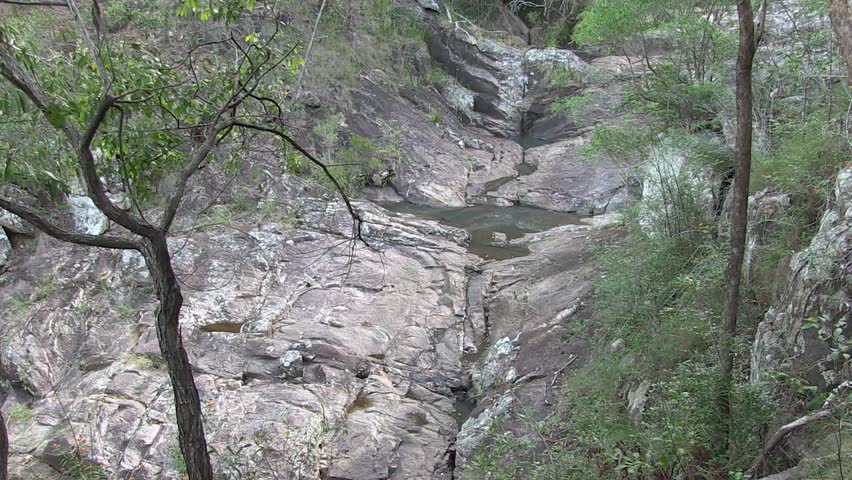 The worn pink granite of West Ithaca Creek, Brisbane, Australia.