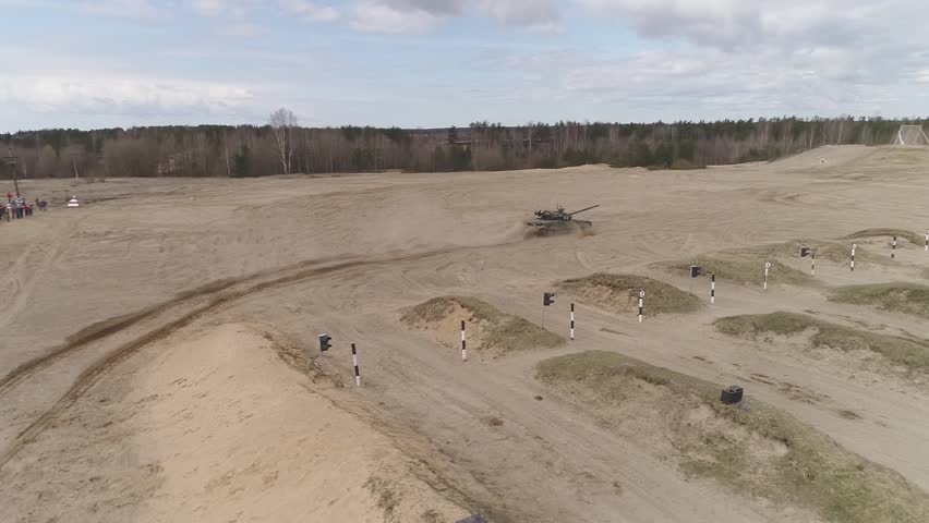 The tank quickly rides the sand
