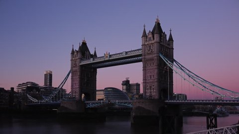 Time lapse of Tower Bridge at sunrise (London, England). Night to day a beautiful morning with clear blue skies. December 2016.