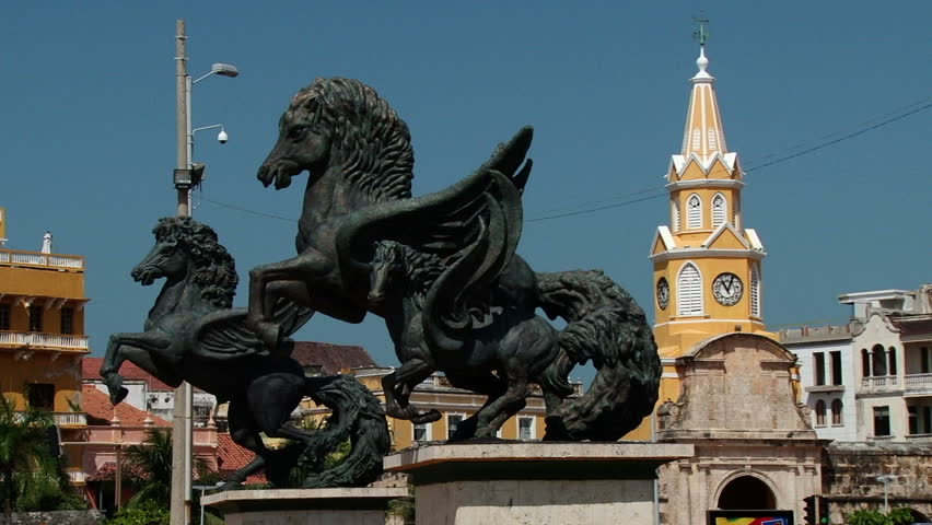 CARTAGENA/COLOMBIA - 29TH DECEMBER 2010: People going through old entrance of walled city in Cartagena, Colombia