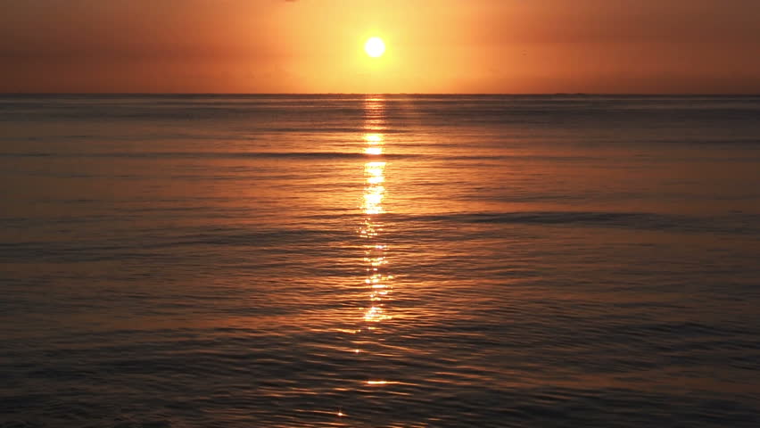 Sunrise over sea, tranquil landscape