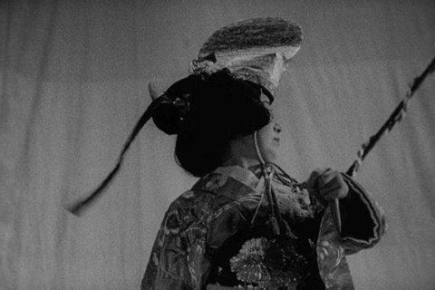 1950s: Sumi Yukawa, wife of Dr. Hideki Yukawa, performs a traditional Japanese dance, in 1954.