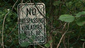 Creepy No Trespassing sign
