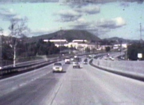 Vintage rear view 8mm time lapse driving shot of the Ventura 101 Freeway in 1982.  