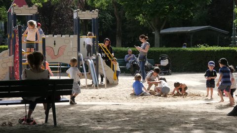 PARIS, FRANCE - MAY 22, 2017: Champ De Mars Park Playground For Children With Kids Funny Playing