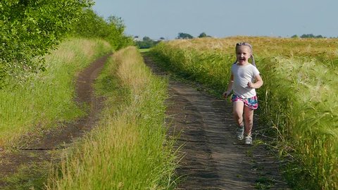 Dirt road little girl runs