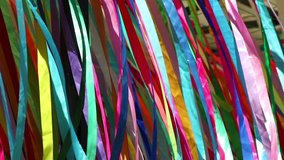 Abstract view of colorful cloth bands in a park on the wind