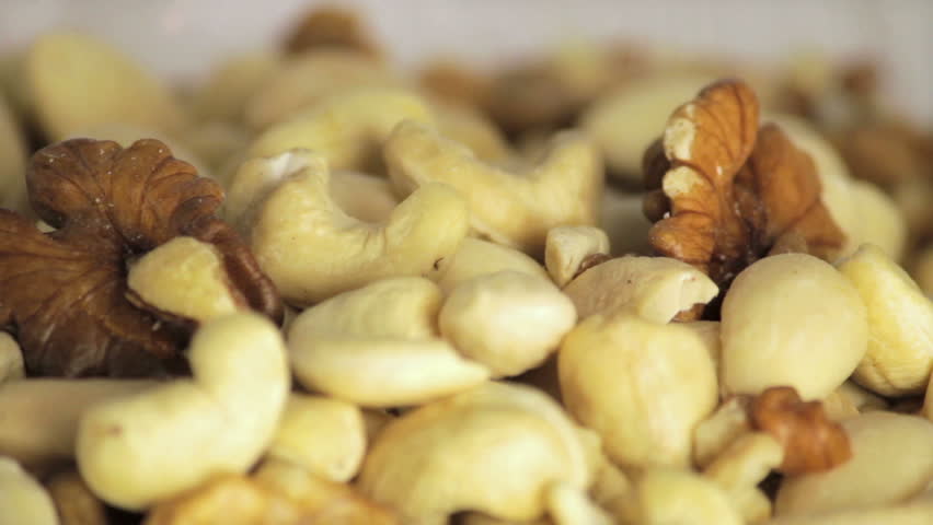Pile of different nuts rotates