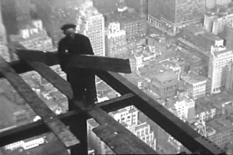 1930s: Construction workers erect the world\x90s tallest building in New York City in the 1930s