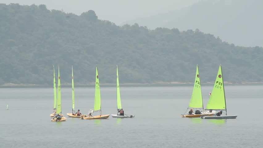 HONG KONG - AUGUST 28: Sailboats racing through the sea. shot on August 28, 2011