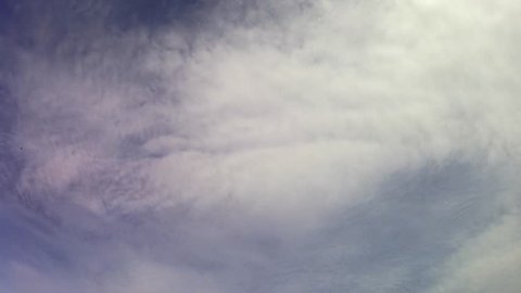 Clouds moving on blue sky. 4K. Timelapse.