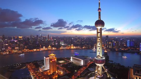 Shanghai, China - CIRCA JULY 2012:  Time lapse of Shanghai Skyline and Oriental Pearl Tower at dusk.  >>> Please search similar: " ShanghaiSkyline " .