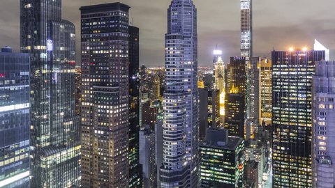 Time lapse! Midtown Manhattan New York City at night from 62nd floor. 