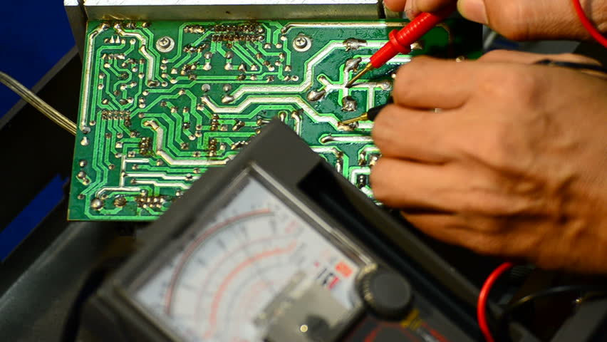 Electrical is testing with voltmeter for repair electronic equipment