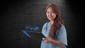 Young Asian female medical professional in uniform uses futuristic holographic console to monitor patient's healthcare information. Check my portfolio for more color options of this video file.