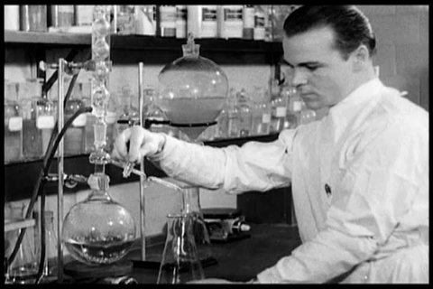 1940s: Laboratory researchers study the disease of cancer, in 1940.