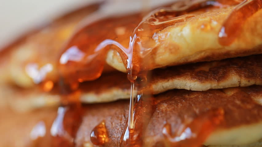 Food Pancake Maple syrup pouring onto stack of pancakes. Making Pumpkin Pancakes on Frying Pan. Homemade Griddle Cakes Royalty-Free Stock Footage #28092952