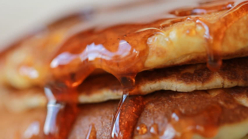 Food Pancake Maple syrup pouring onto stack of pancakes. Making Pumpkin Pancakes on Frying Pan. Homemade Griddle Cakes Royalty-Free Stock Footage #28092952