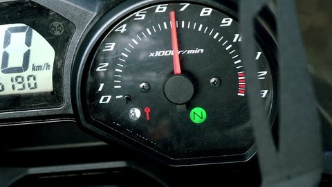 tachometer of sports bike in the process of starting the engine.