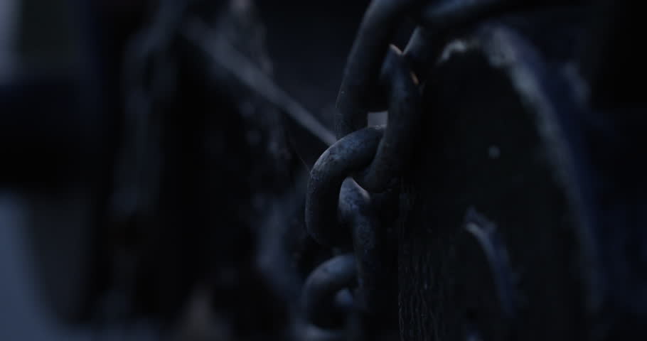 old rusty chains extreme close up - tilt up