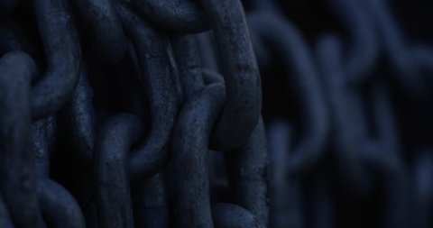 Steel chains extreme close up -reveal shot- copy space right
