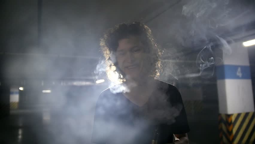 Vaper smiling in the camera lens
