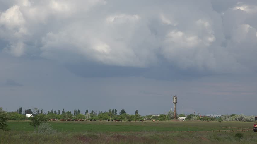 Rural landscape from highway before summer storm