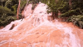 Clear water of waterfall in tropical forest
