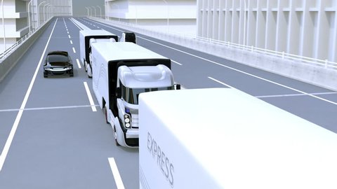 A fleet of autonomous trucks driving on highway. Connected cars concept. 3D rendering animation.