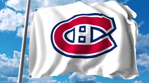 Waving flag with Montreal Canadiens NHL hockey team logo. 4K editorial clip