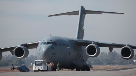 SANTIAGO, CHILE - MARCH 25: Large military transport plane US Air Force C-17 Globemaster jet getting ready for departure on March 25, 2010 in Santiago, Chile