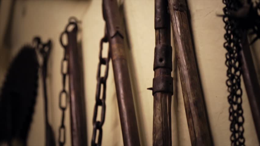 Torture weapons hanging on the wall