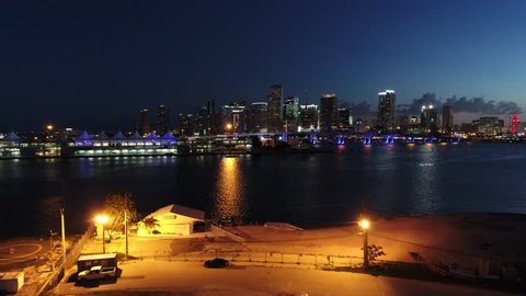 MIAMI, FL, USA - JUNE 24, 2017: Aerial drone video Downtown Miami twilight at night 4k port biscayne bay