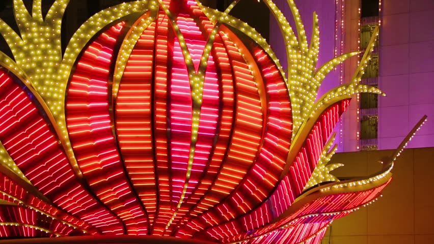 Las Vegas Neon Lights. Neon flashing lights of Las Vegas Casino. Flashing neon light on the famous Las Vegas Strip. Red Neon Flashing Illuminated Bulbs.