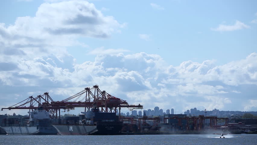 Waterplan Take-Of in front of cranes at the container port terminal in Vancouver