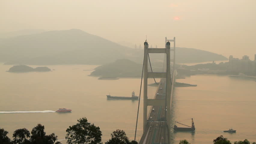 Tsing Ma Bridge and  ship at Sunset - Tsing Ma Bridge is a bridge in Hong Kong.