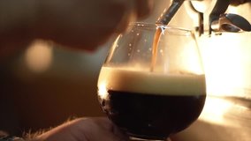 Beer is pouring into the angled glass. Stout, Light, Unfiltered beer, ready to drink beer - Powered by Shutterstock - Get 15% off with code: PIKWIZARD15