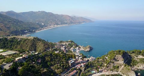 Aerial drone footage of panoramic view of Taormina in Sicily, Italy
