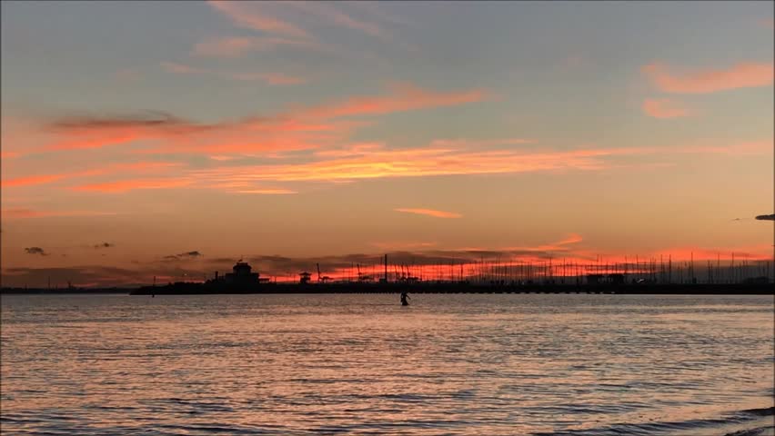 Beautiful sunset in St.Kilda, Melbourne, Australia. Very beautiful day when the sun set and start of colorful around the sky. Surrounding with the beach. 