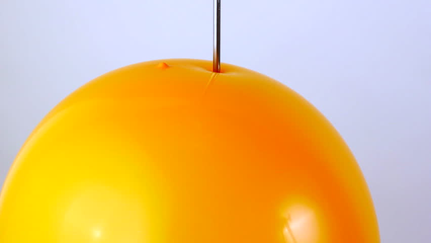 Orange balloon explodes